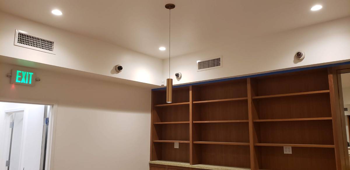 A room with shelves and lights in it