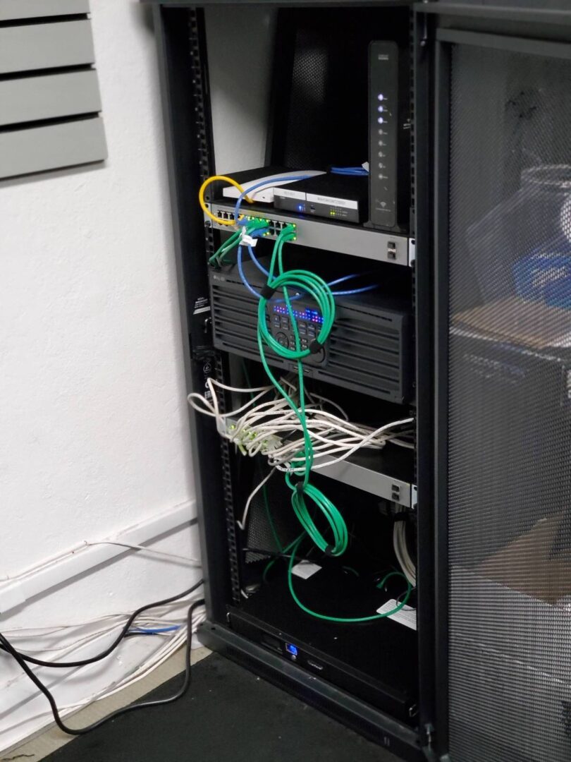 A rack with wires and cords on it.