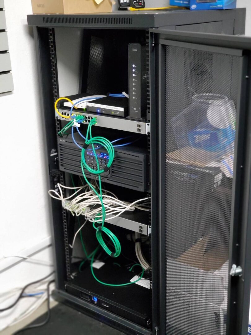 A rack with wires and cords on it.